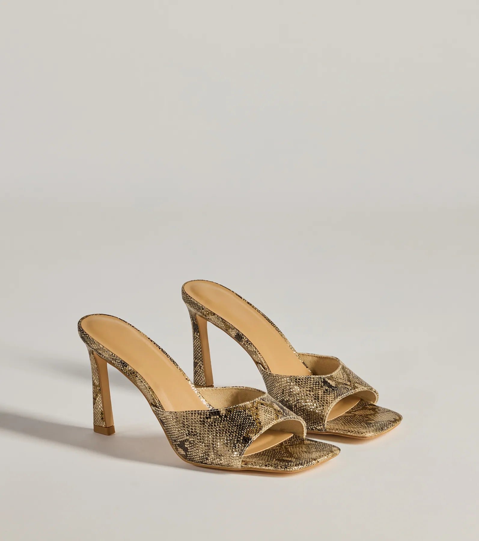 07401-5178_1_SNAKE_StrikingChicSnakePrintStilettoMules Striking Chic Snake Print Stiletto Mules - Image 1